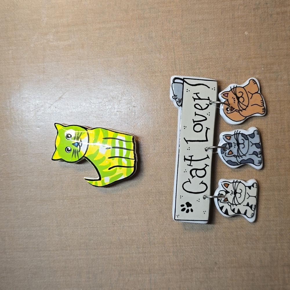 Cat pin and button cover